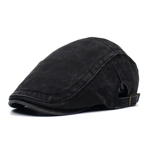 Vintage washed cotton newsboy cap in dark charcoal grey with adjustable metal buckle