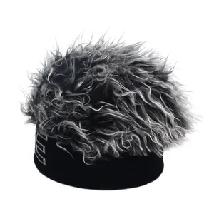 Macro shot of hip-hop beanie with faux hair wig and white geometric embroidery detail