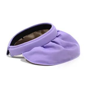 Detailed view of lavender purple sun hat with wide wavy brim and soft breathable fabric