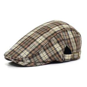 Vintage checkered beret hat in brown and black with adjustable metal side buckle