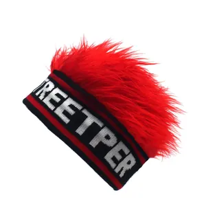 Close-up of knit streetper beanie with red mohawk wig and letter embroidery detail