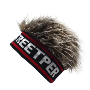 Detail of knitted beanie with STREETPER lettering and long wavy hair wig extension