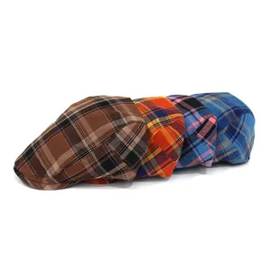 Multiple colors of plaid ivy caps showing vintage british style textures and grid patterns