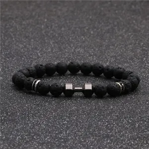 Lava rock beaded bracelet with grey metal dumbbell charm for fitness enthusiasts