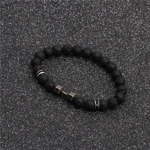 Lava stone beaded bracelet featuring a dark grey metal dumbbell charm for fitness lovers