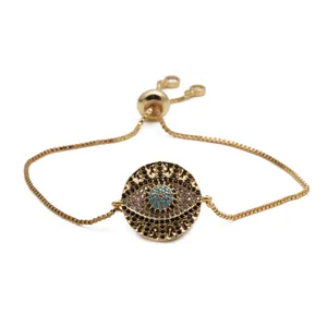 Adjustable golden box chain bracelet featuring a blue evil eye pendant with micro-set zircon