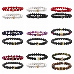 Close-up display of beaded bracelets set with crowns in nine diverse stone color combinations
