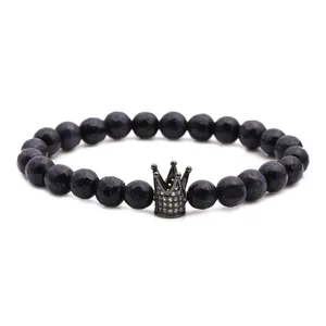 Bracciale elastico con pietre di arenaria blu e corona nera con zirconi incastonati