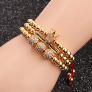 Three-piece gold beaded men's bracelet set with crown, bar, and pavé zircon balls
