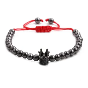 Verstellbares rotes Seilarmband mit Kupferperlen und Zirkon-Pave-Kronenanhänger