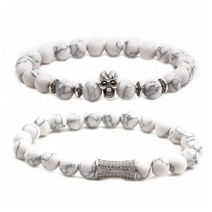Mens beaded bracelet set with white turquoise stone beads and silver skull charms