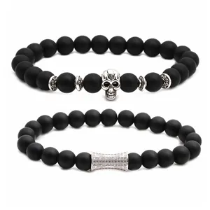 Mens matte black stone bead bracelets with silver skull charm and crystal bar accents