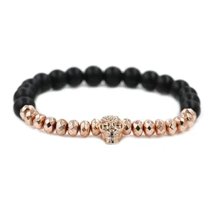 Men's matte black beaded bracelet with rose gold crown skull and faceted metal beads
