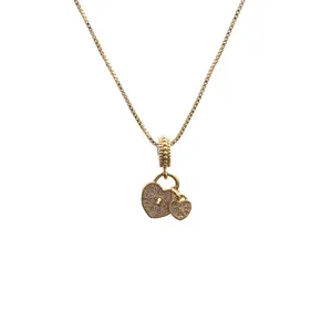 Collar de doble corazón dorado con circonitas pavé y cadena veneciana de mujer