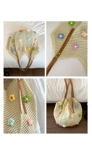 Close-up of hollow knit tote bag with colorful 3D crochet flowers and leather strap