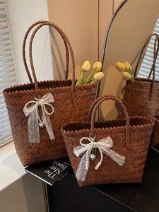Women Vintage Woven Straw Tote Bag With Lace Bow Artificial Pearl Heart Pendant Retro Hand-Woven Beach Vacation Handbag Basket Bag
