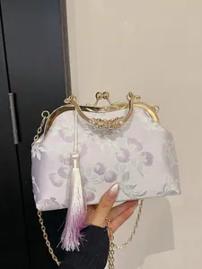 Elegant purple floral jacquard evening bag with golden metal clasp and silk tassel