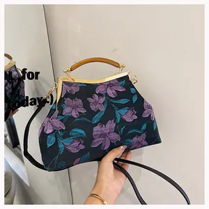 Macro detail of Chinese retro fabric bag featuring 3D floral embroidery and wooden handle