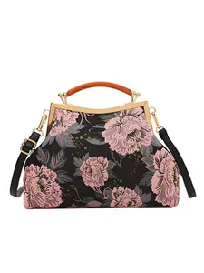 Retro black floral jacquard handbag with metal frame and pink peony flower patterns