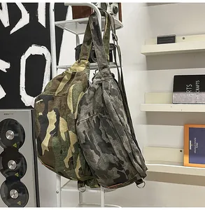 Detail view of stylish leopard and camo canvas sling bags on a minimalist display shelf