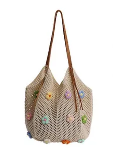Hollow-out crochet knit tote bag with colorful 3D floral accents and brown leather handles