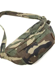 Front view of a large leopard print canvas chest bag with adjustable crossbody strap