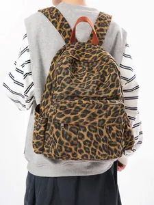 Fashionable leopard print canvas backpack with large capacity for travel and school use