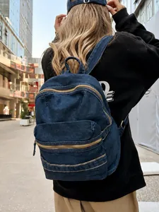 Retro washed denim backpack in navy blue for students with large capacity and durable fabric