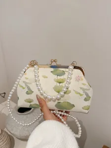 Elegant Chinese style evening bag with floral embroidery and pearl chain strap