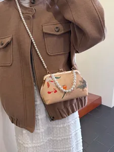 Vintage oriental embroidery bag with bird motifs and dual pearl chain straps