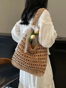 Sac fourre-tout en paille tissée ajourée avec nœud en dentelle pour la plage et l'été