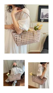 Close-up of pink woven basket bag featuring hollow pattern and beige drawstring inner pouch