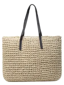 Handwoven straw tote bag with brown leather straps for summer beach or casual daily commute