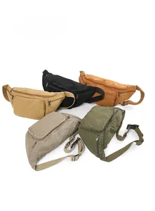Detail showing various colors of durable canvas crossbody bags with multiple zipper pockets