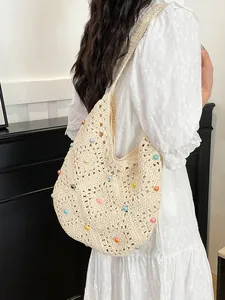 Bohemian crochet tote bag with colorful beads and grandmother square knit pattern