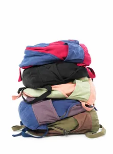Detailed grid of five colorful canvas backpacks showing various stylish color combinations