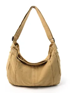 Retro khaki canvas messenger bag with wide adjustable shoulder strap and crescent shape