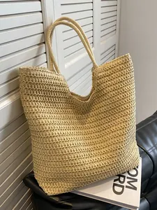 Grand sac cabas en paille tissée beige avec doubles anses et doublure pour les vacances d'été