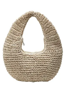 Bohemian hollow straw beach handbag with crescent shape and top zipper closure