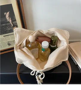 Interior view of large capacity crochet tote bag with zipper and inner lining detail