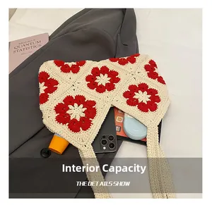 Internal capacity of hand-woven floral tote bag showing space for phone and makeup