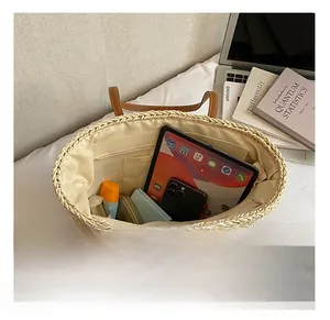Detailed interior of the woven tote bag showing large capacity for daily items