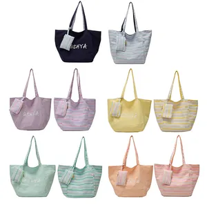 Bolsos tote grandes de lona en cinco colores con estuches a juego y letras blancas