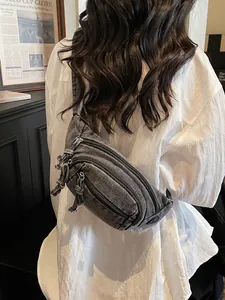 Vintage dark grey washed denim crossbody chest bag with multiple zipper compartments