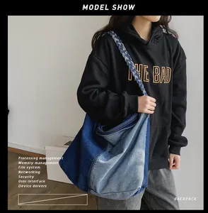 Detail shot of the braided shoulder strap on a patchwork denim tote bag for women