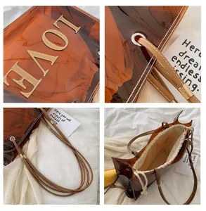 Detail of amber transparent PVC tote bag with LOVE leather patch and canvas inner pouch