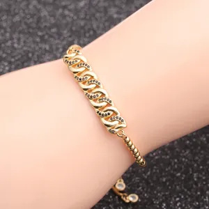 Gold multi-link men's bracelet featuring micro-pave black cubic zirconia stones