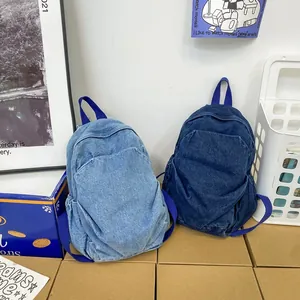 Vintage-Rucksäcke aus gewaschenem Denim in Blau und Dunkelblau für Schule und Reisen