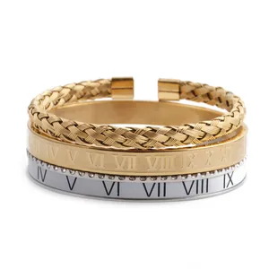 Detailed close-up of a three-piece Roman numeral bracelet set with gold and silver finishes