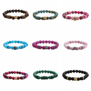 Collection de bracelets en perles tête de mort avec oeil de tigre et pierre volcanique variés